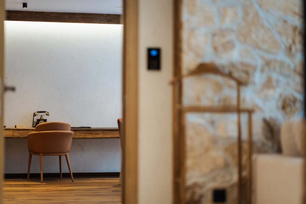 Chalet Prestige 215: desk by a stone wall – Flora Boutique Hotel, hotel in Borovets